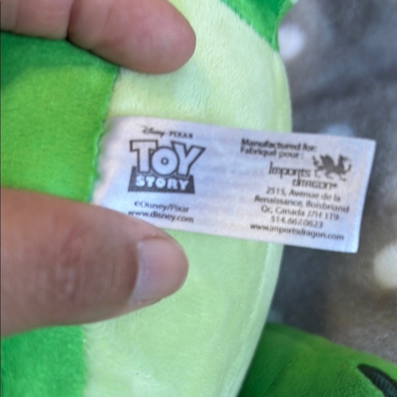 Disney Green Stuffed Dinosaur Toy with Textured Surface and Dynamic Pose - Picture 4 of 5